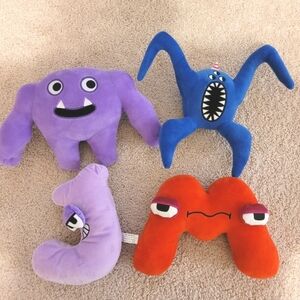 Alphabet Lore letters J and M toys and Guuzogg